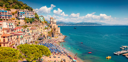 Incredible summer view of historical landmark - Torre di Cetara tower. Spectacular morning cityscape of Cetara town. Wonderful Mediterranean seascape. vacation concept background.の写真素材
