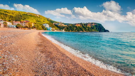 Stunning morning view of Himare town. Charming spring seascape of the Adriatic sea. Attractive outdoor scene of Albania, Europe. Travel concept background.の写真素材