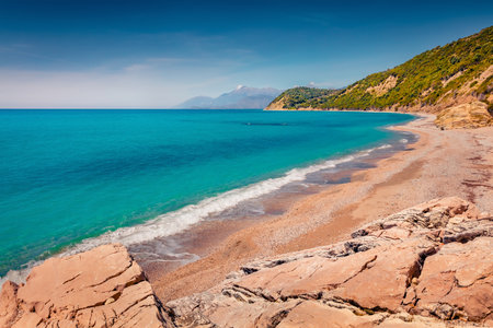 Rocky morning view of Lukove beach with endless horizon. Magnificent spring seascape of the Adriatic sea. Spectacular outdoor scene of Albania, Europe. beauty of nature concept background.の写真素材