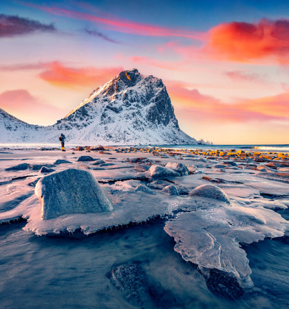 Photographer takes picture of Haukland Beach, Vastvagoy. Amazing scene of Lofoten Island, Norway, Europe. Wonderful seascape of Norwegian sea. beauty of nature concept background.の写真素材