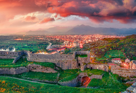 Dramatic evening view of the ruins of Rozafa Castle. Wonderful sunset in Shkoder city. Impressive outdoor scene of Albania, Europe. Travel concept background.の写真素材