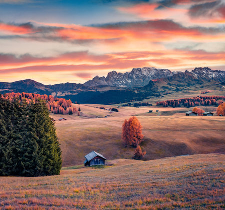 Fantastic sunrise in Alpe di Siusi village. Dramatic autumn scene of Dolomite Alps, Ortisei locattion, Italy, Europe. beauty of nature concept background.の写真素材