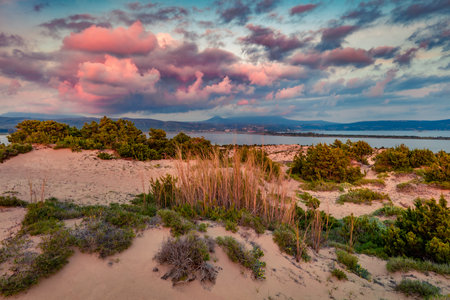 Astonishing summer view of Voidokilia beach. Spectacular sunset on Ionian Sea, Pilos town location, Greece, Europe. vacation concept background.の写真素材