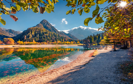 Beautiful Alps scenery. Attractive morning view of Jasna lake. Wonderful autumn scene of Julian Alps, Gozd Martuljek location, Slovenia, Europe. Beautiful landscape of Triglav National Park.の写真素材