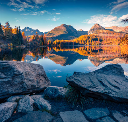 Magnificent autumn view of Strbske pleso lake. Spectacular morning scene of High Tatras National Park, Slovakia, Europe. beauty of nature concept background.の写真素材