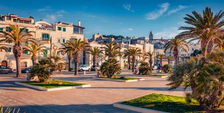 Panoramic morning view of central park of Vieste town. Sunny summer scene of Apulia, Italy, Europe. Travel concept background.の写真素材