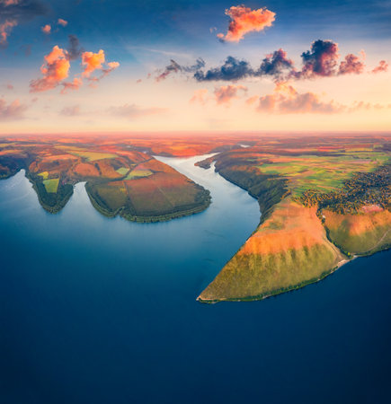 Fantastic morning view from flying drone of Bakotska Bay. Colorful summer sunset on Dnister river, Ukraine, Europe. Beauty of nature concept background.の写真素材