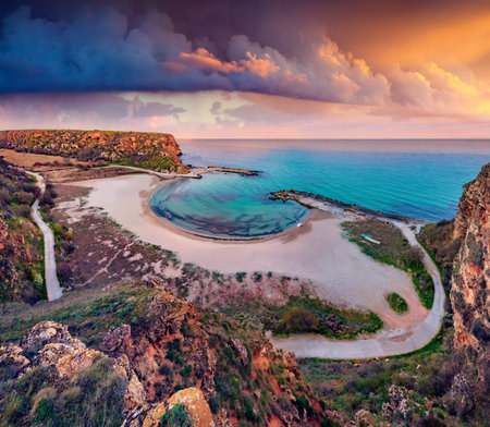 Horseshoe-shaped beach on Black sea. Stunning sunrise on Bolata beach, Bulgaria, Europe. vacation concept background.の写真素材