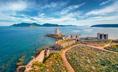 Picturesque summer view from flying drone of old Methoni Castle. Aerial seascape of Ionian sea. Beautiful outdoor scene of Peloponnese peninsula, Greece, Europe. Travel concept background.の写真素材
