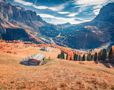Stunning morning view from the top of Gardena of Italian Alps. Beautiful autumn scene of Dolomite Alps, Canazei, Province of Trento, Italy, Europe. Travel concept background.の写真素材