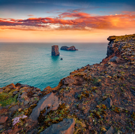 Aerial evening view of Dyrholaey Nature Reserve. Fabulous sunset on south coast of Iceland, Europe. beauty of nature concept background.の写真素材