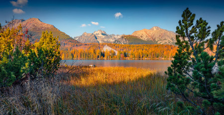 Captivating autumn view of Strbske pleso lake. Majestic morning scene of High Tatra National Park, Slovakia, Europe. beauty of nature concept background.の写真素材