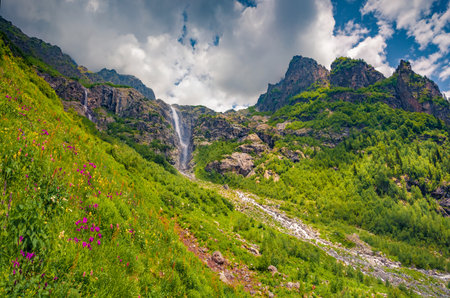 Majestic summer view of mountain peaks and waterfall in Caucasus Mountains. Colorful morning scene of Upper Svaneti, Georgia, Europe. beauty of nature concept background.の写真素材