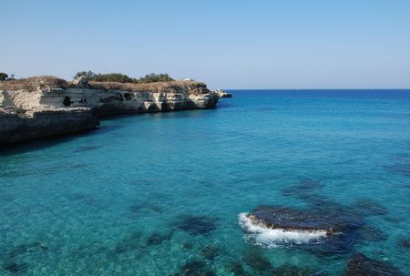 A beautiful stretch of rocky coastline with clear blue waters in Puglia, southern Italy. The area is known by locals as 'The Poetry'. の写真素材