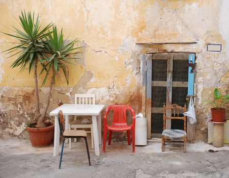 The front of an old house in the southern Italian port town of Gallipoli の写真素材