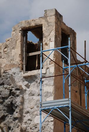 Restoration work on one of the many old historic buildings in backstreet Lecce which are in need of repair or rebuilding の写真素材