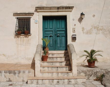 A door in the Caveoso Sassi in the Italian town of Matera in the region of Basilicata. The town is...
