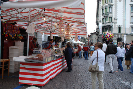 Udine, Italy, 09.21.08: A stall selling sweets and nuts. The stall is part of the annual Friuli Doc festival which celebrates the food, drink and craft of the regionのeditorial素材