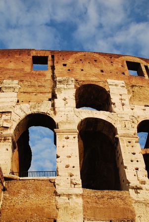 Arch details in the Colosseum in Rome, Italy. The iconic Colosseum is an elliptical amphitheatre, the largest ever built by the Romans. の写真素材