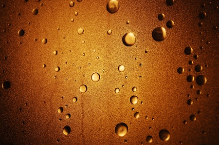 Light shines through a plastic shower door with a bubble-effect surfaceの写真素材