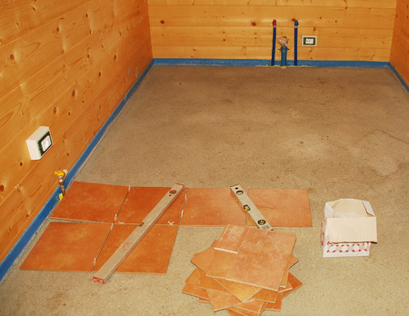 A concrete floor in a newly built wooden  fir  house which is about to be tiled の写真素材
