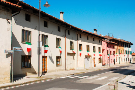 Risano, Italy - 9th March 2014  The village is decorated in Italian flags - the Il Tricolore - in celebration for an Alpini event in the villageのeditorial素材