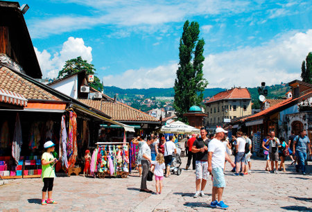 Sarajevo, Bosnia and Herzegovina - August 10th 2014. Goods for sale outside tourist souvenir shops in a street in Bascarsija Square, Sarajevo