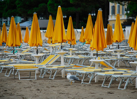 Grado, Italy - September 12th 2014. Grado beach on a cold September day. At this time of year, the beach is usually still busy, but an unusually cold and wet summer has left beaches desertedのeditorial素材