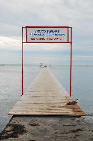Grado beach in north east Italy on a cold September day. の写真素材