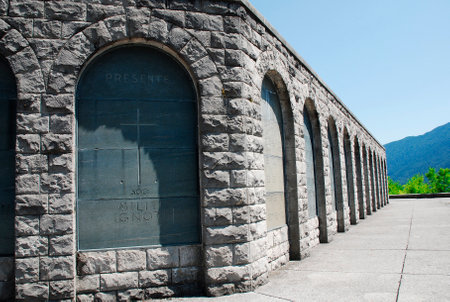Arches of the Italian Charnal House located on Gradic Hill in Kobarid, in the Littoral region of north east Slovenia. Opened in 1938, it contains the remains of 7,000 Italian solders who were killed in the First World War. The inscription indicates "Preseのeditorial素材