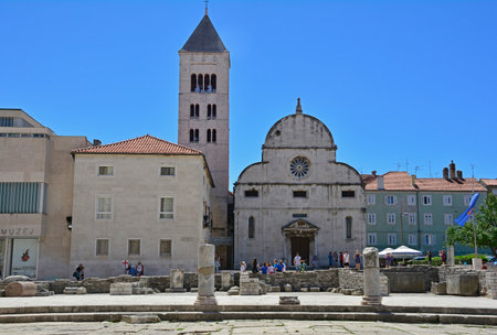 Zadar, Croatia - June 18th 2016. Tourists walk around the Roman Forum and other historic buildings in the Croatian city of Zadar.のeditorial素材