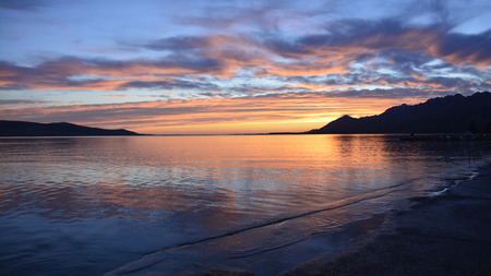 A beautiful summer sunset on the coast near Rovanjska in Zadar Country, Croatia.