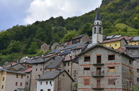 The hill village of Casso in Friuli Venezia Giulia, north east Italy. With a population now of only 35, the village is famous locally for having being evacuated following the 1963 Vajont Dam disaster.の写真素材