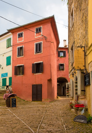 Oprtalj, Croatia - August 31st 2018. A local wine gift shop awaits tourists in a square in the historic hill village of Oprtalj in Istria, Croatiaのeditorial素材