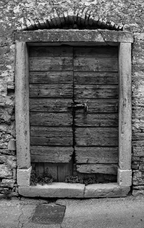 A door in the historic village of Vodnjan (also called Dignano) in Istria, Croatiaの写真素材