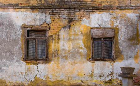 Windows in an abandoned old house in the village of Suvoj in Sisak-Moslavina County in central Croatiaの写真素材