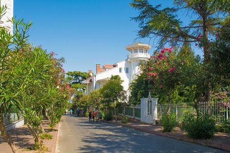 A quiet residential street in Buyukada, one of the Princes' Islands, also known as Adalar, in the Sea of Marmara off the coast of Istanbul, Turkey. の写真素材