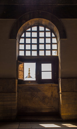 A window in the upper gallery in Ayasofia or Hagia Sofia in Sultanahmet, Istanbul, Turkey, taken on the ground floor. Built in 537 AD as a church, it was converted into a mosque in the mid-1400s.のeditorial素材