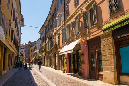 Gorizia, Italy - April 20th 2019. People walk down the historic Via Rastello in the north eastern Italian city of Gorizia in the Friuli Venezia Giulia regionのeditorial素材