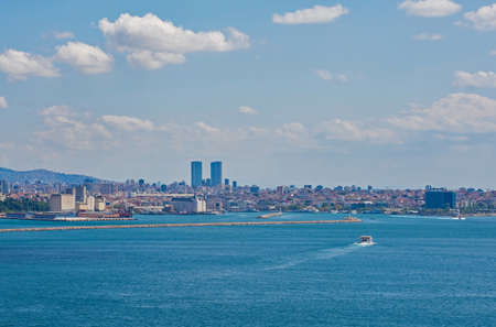 Istanbul viewed from the near the Sofa Mosque in Topkapi Palace, an area also called the Fifth Place or the Outer Gardens. Looking at the Asian side of the Bospherus towards Moda in Kadikoyの写真素材