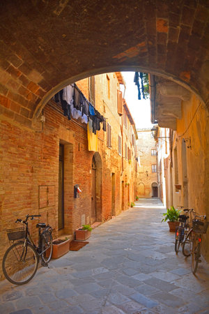 A residential alley in the historic medieval village of Buonconvento, Siena Province, Tuscany, Italyのeditorial素材