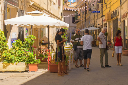 Grosseto, Italy - Septemer 4th 2020. A pedestrianised street in central Grosseto, Tuscany containing...
