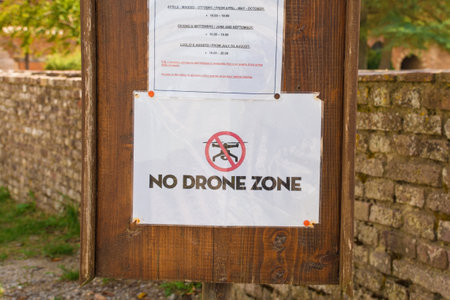 Chiusdino, Italy - 7th September 2020. A sign near the entrance to the grounds of the historic San Galgano Abbey warns visitors that they must not use dronesのeditorial素材