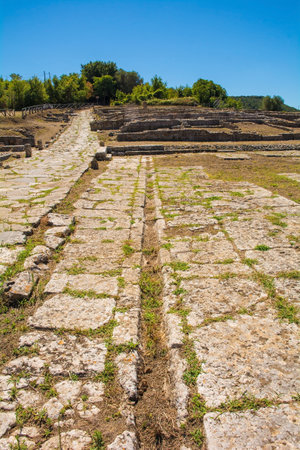 Grosseto, Italy - September 4th 2020. The ruins the Roman Forum in Roselle or Rusellae, an ancient Etruscan and Roman city in Tuscany which was abandoned in the Middle Ages. The forum dates from the 1st century B.C.のeditorial素材