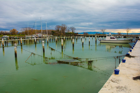 Winter at the marina of an out-of-season beach resort near Grado, Friuli-Venezia Giulia, north east Italyのeditorial素材