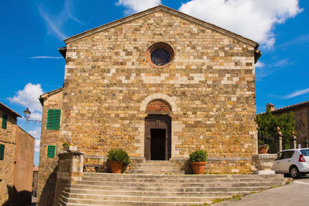 The Parish Church in the historic centre of the medieval town of Monticiano in Siena Province, Tuscany, Italy. The church is know as Parrocchia e Chiesa di Santi Giusto e Clemente - Church of Saints Justus and Clementsの写真素材