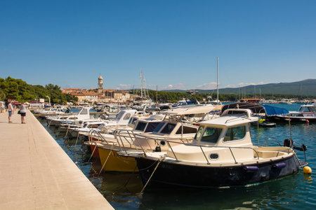 Krk, Croatia - September 2nd 2021. Boats in the marina of the historic medieval coastal town of Krk on Krk island in the Primorje-Gorski Kotar County of western Croatiaのeditorial素材