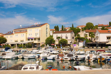 Malinska, Croatia - 7th September 2021. The marina at the small town of Malinska on the coast of Krk island, Primorje-Gorski Kotar County, western Croatiaのeditorial素材