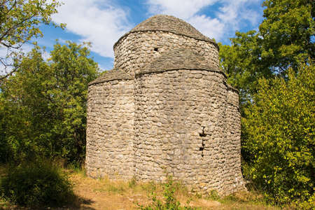 The Romanesque Chapel of Saint Grysogonus near  Milohnici village on Krk island, Croatia. Dating from 11th-12th century, it is one of only two churches of the cruciform four-leafed kind still in existence in Croatiaの写真素材