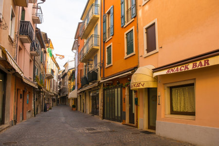 Garda, Italy - December 27th 2021. A shopping street at Christmas in Garda town on the east shore of lake Garda, Verona Province, Veneto, north east Italyのeditorial素材